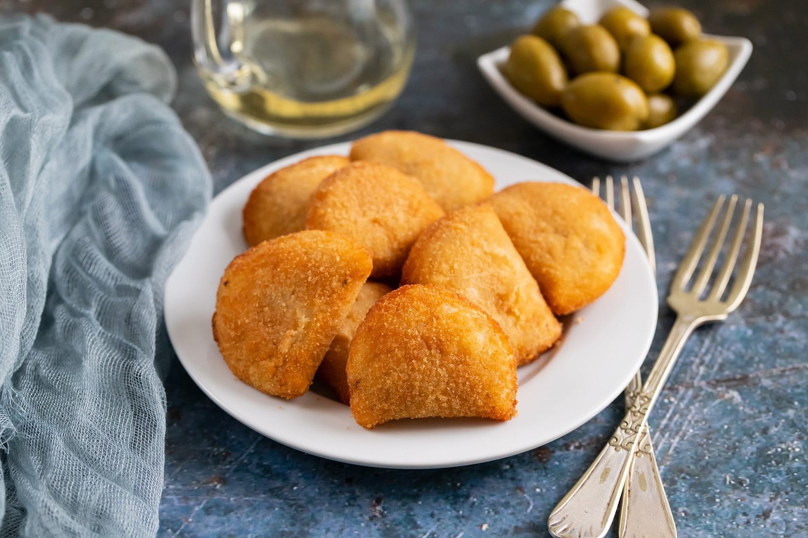 Rissóis – breaded, deep-fried pastries with creamy stuffing Rissóis – breaded, deep-fried pastries with creamy stuffing