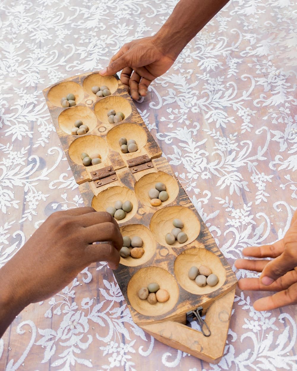 Mancala, photographed by Amusan John, via Pexels