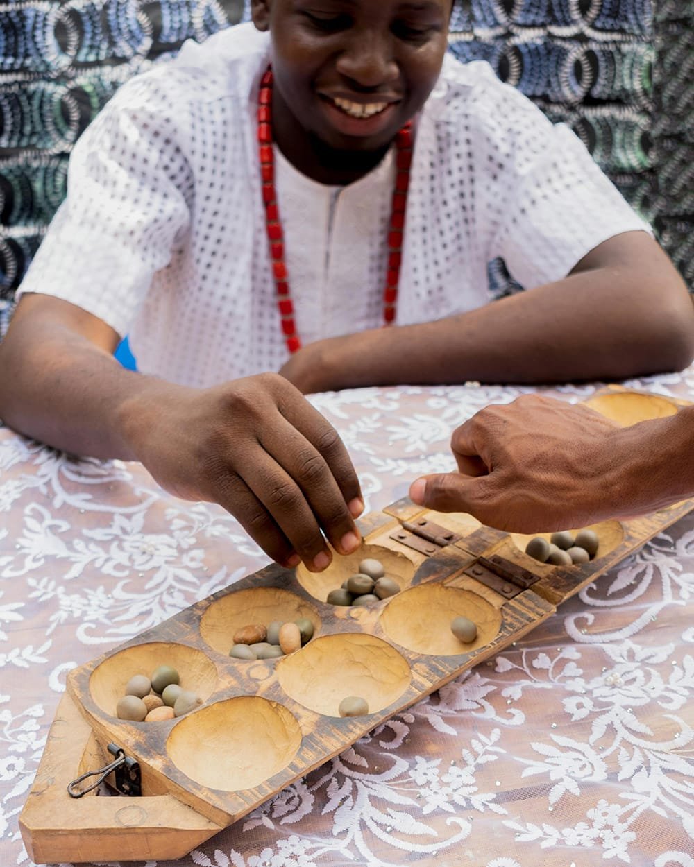 Mancala, photographed by Amusan John, via Pexels