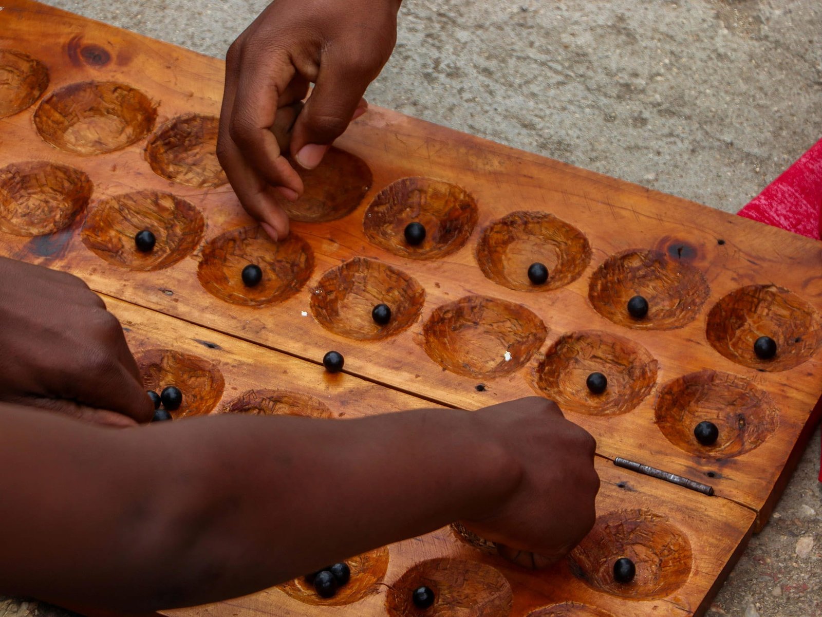 Traditional Urusoro Board Game Played Outdoors, by Omar Photographer, Rwanda, via Pexels